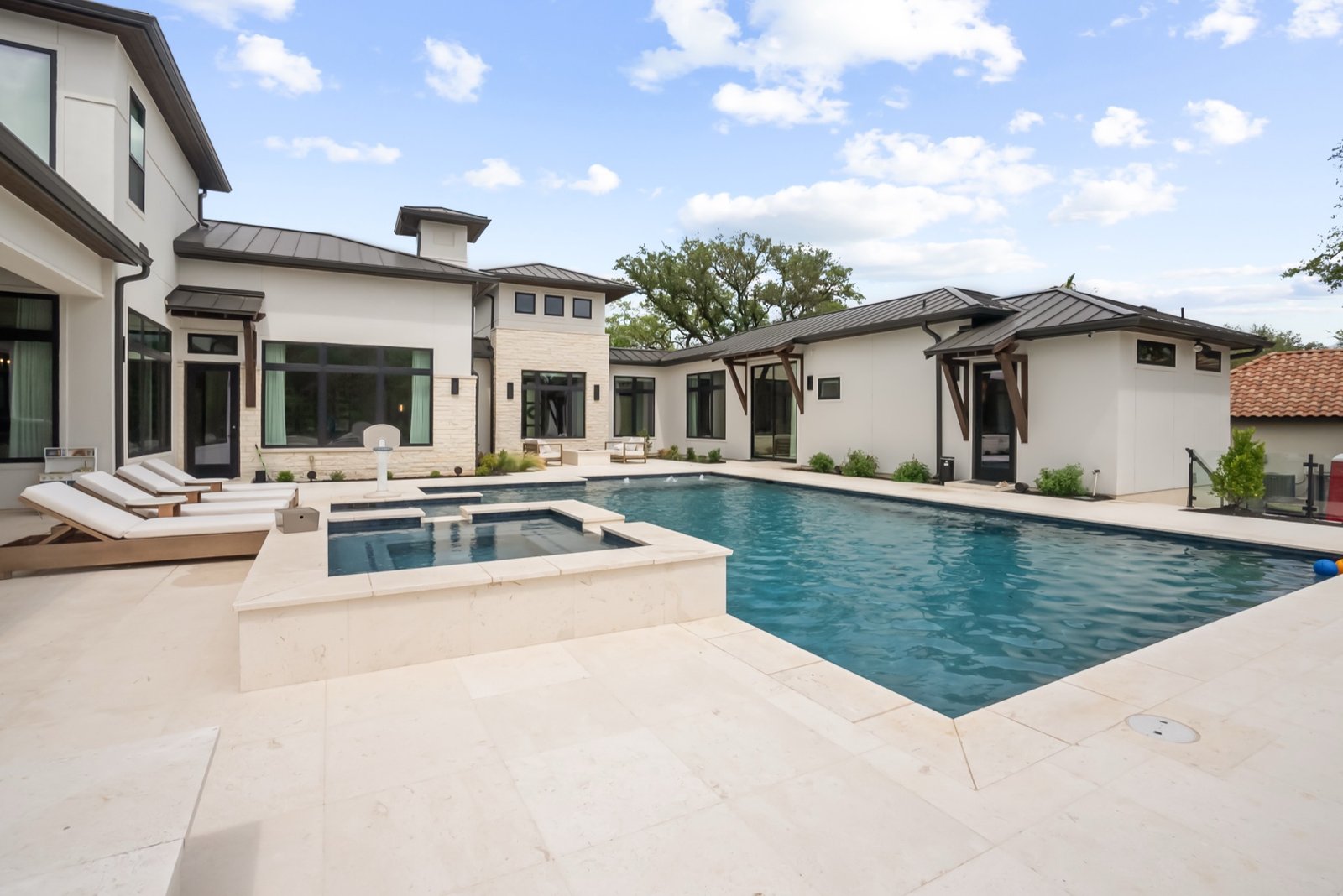 Twilight exterior of a Hill Country estate